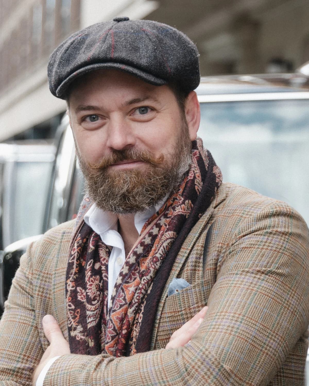 Jack Harris in front of London taxis