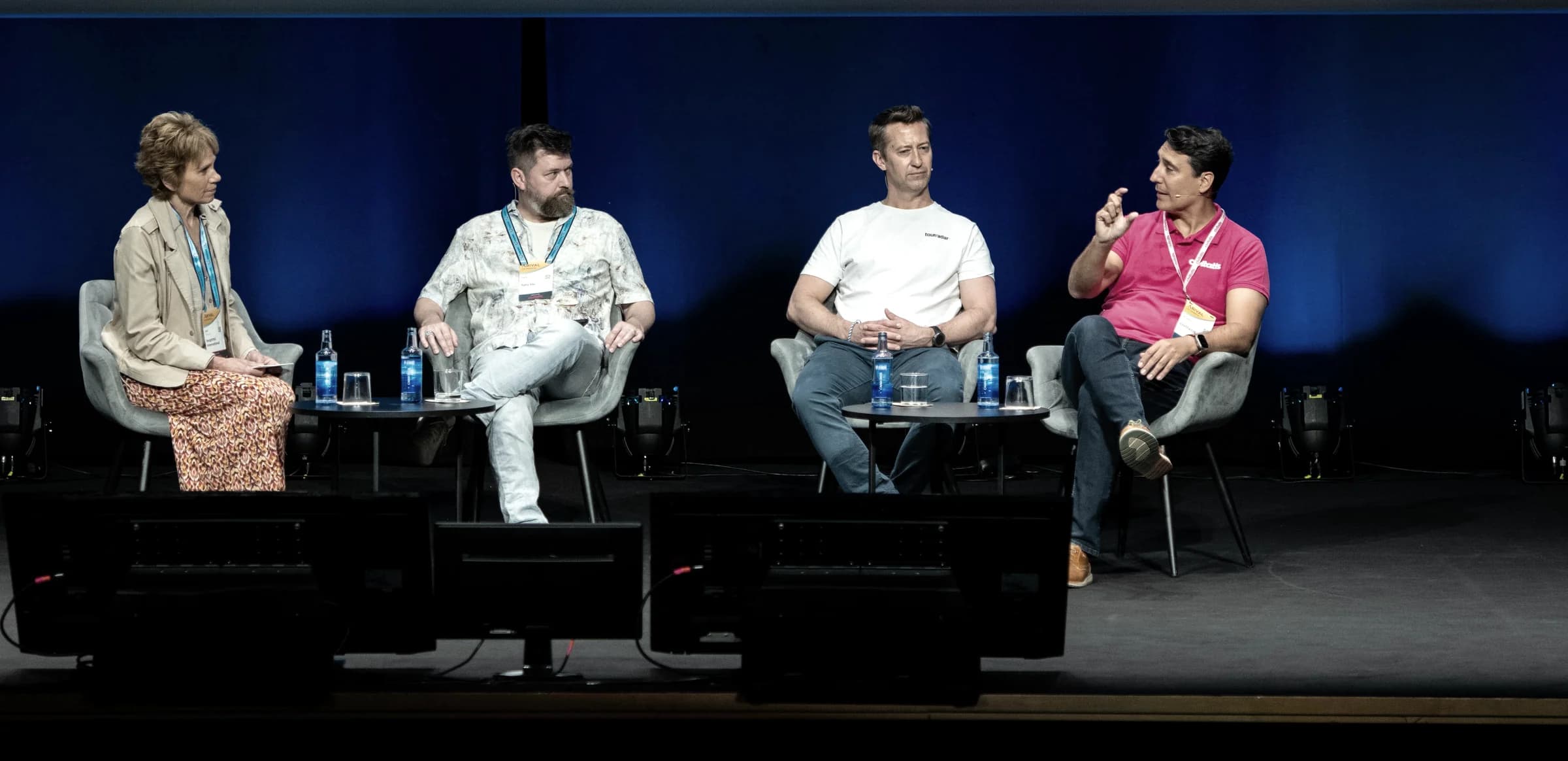 Jack Harris in a panel discussion on stage at Arival, Valencia